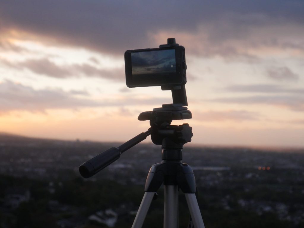 Smartphone on tripod at sunset